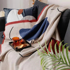 Clysella Throw Blanket