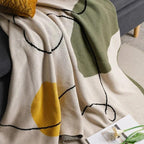 Clysella Throw Blanket