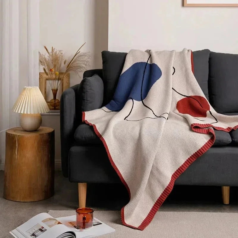 Clysella Throw Blanket