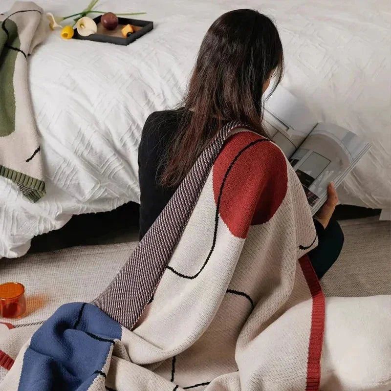 Clysella Throw Blanket