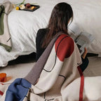Clysella Throw Blanket