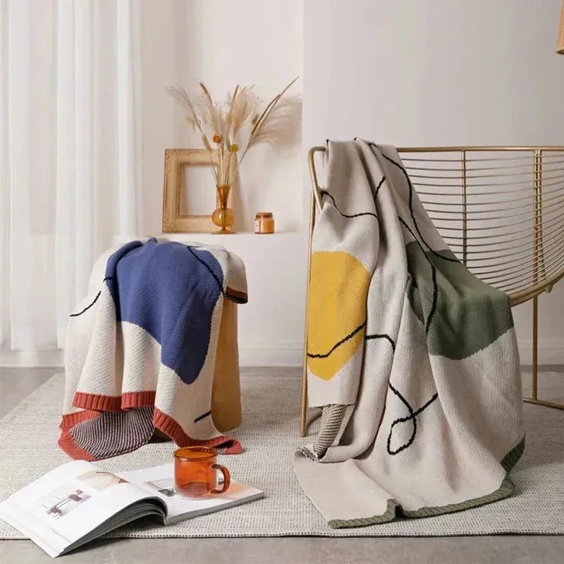 Clysella Throw Blanket