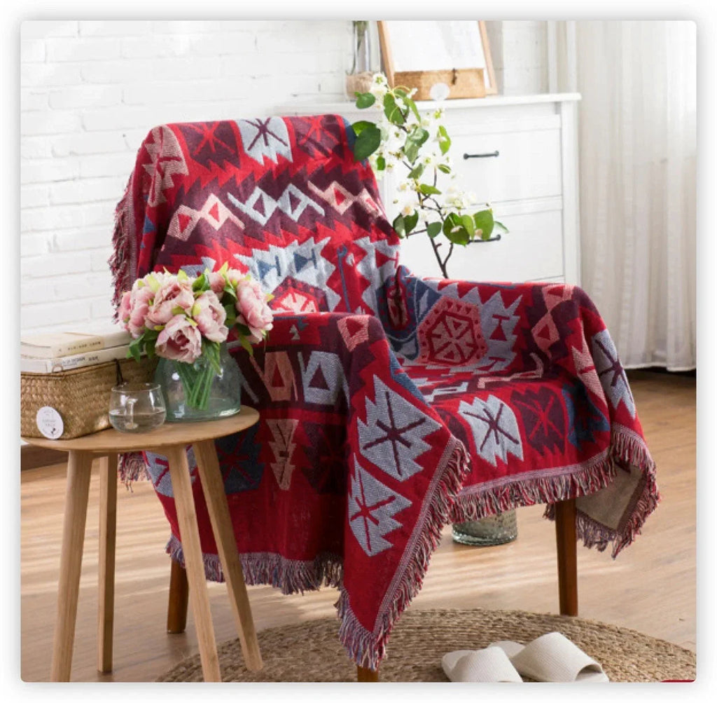 Emosa Throw Blanket