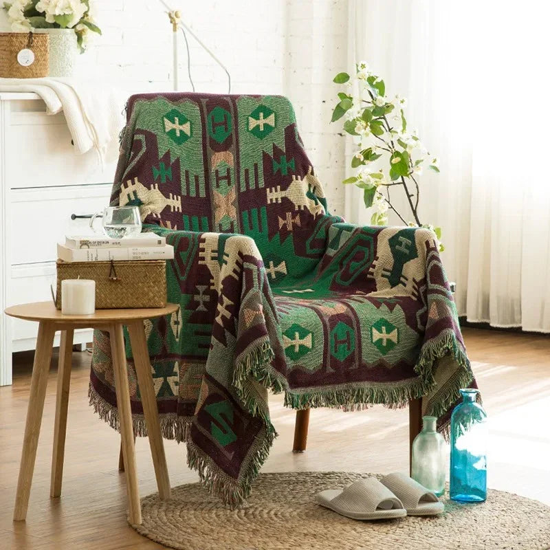 Emosa Throw Blanket
