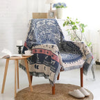 Emosa Throw Blanket