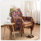 Emosa Throw Blanket