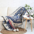 Emosa Throw Blanket