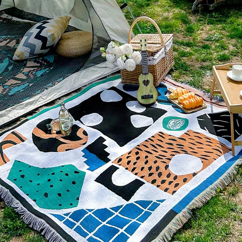 Insella Throw Blanket