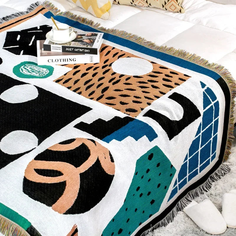 Insella Throw Blanket
