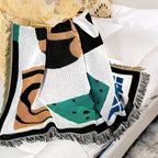 Insella Throw Blanket