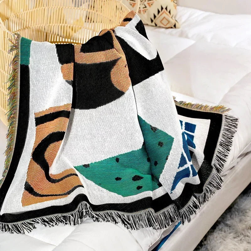 Insella Throw Blanket