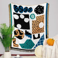 Insella Throw Blanket