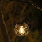 Outdoor Solar Hanging Lights in Metal Cage with Warm LED Candle Light | TheKanta