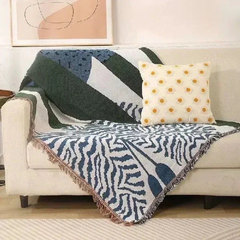 Urtirra Throw Blanket