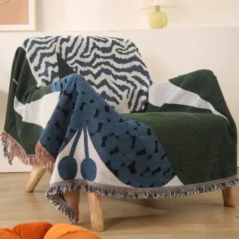 Urtirra Throw Blanket