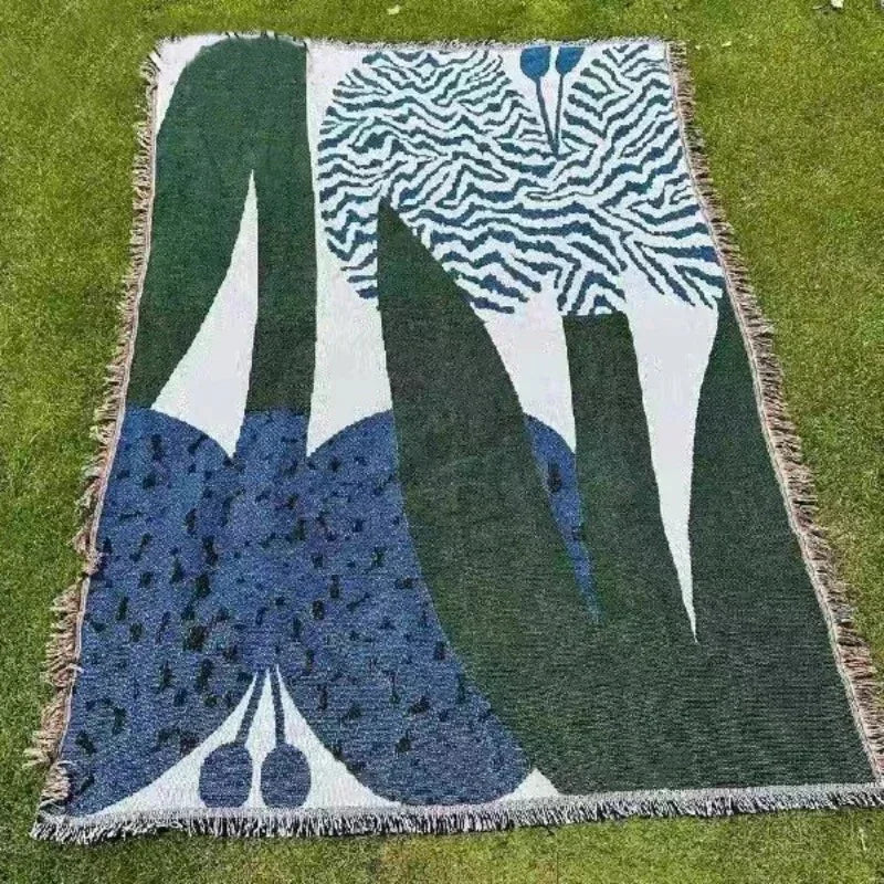 Urtirra Throw Blanket