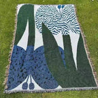 Urtirra Throw Blanket