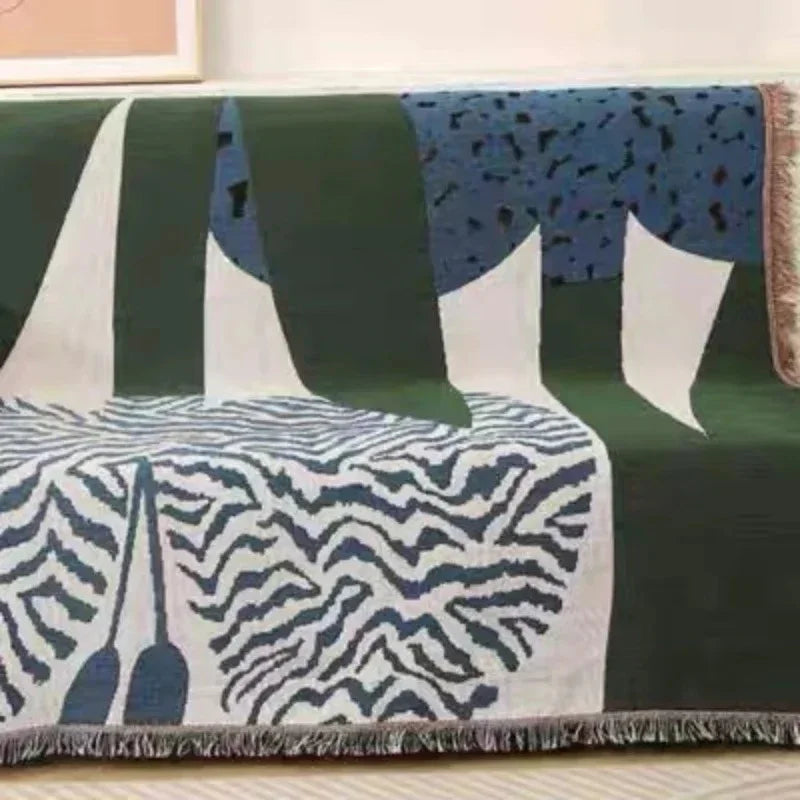 Urtirra Throw Blanket