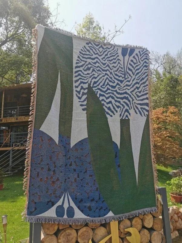 Urtirra Throw Blanket